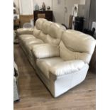 A CREAM LEATHER RECLINER 3 SEATER SOFA WITH MATCHING ARM CHAIR AND VIBRATING AND HEAT FEATURES WITH