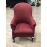 A RED UPHOLSTERED ANTIQUE QUEEN ANNE STYLE LADYS CHAIR
