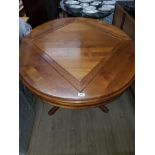 OVAL SHAPED EXTENDING PEDESTAL TABLE