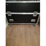 A LARGE HARD BODIED CONCERT CASE