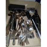 A BOX CONTAINING ASSORTED CUTLERY