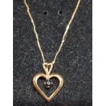 9CT GOLD AND SAPPHIRE PENDANT ON 9CT GOLD CHAIN GROSS WEIGHT 2.