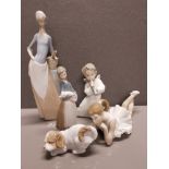 LLADRO FIGURINE ANGEL PLAYING FLUTE WITH 3 NAO AND 1 OTHER LLADRO FIGURE NA