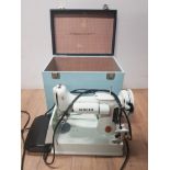 SINGER SEWING MACHINE WITH SEWING MOTOR CONTROLLER IN CARRY CASE