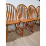 A SET OF 4 WINDSOR BACK CHAIRS