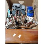 A BOX CONTAINING MODEL SHIPS AND CARS