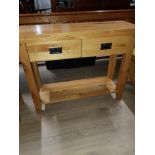 A SOLID OAK HALL TABLE WITH 2 DRAWERS