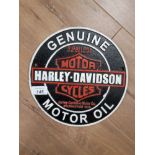 A CAST METAL HARLEY DAVIDSON SIGN