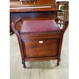 A LEATHER STUDDED MAHOGANY STORAGE PIANO STOOL