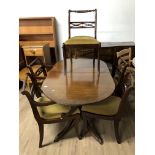 EXTENDING MAHOGANY DINING TABLE ON BRASS CLAW AND BALL FEET AND A SET OF 6 MAHOGANY CHAIRS 2