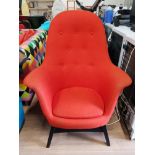 BUTTON BACK FIRESIDE ARMCHAIR UPHOLSTERED IN A ORANGE FABRIC