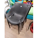 4 PLASTIC STACKING CHAIRS