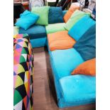 MULTI COLOURED CORNER SETTEE WITH SCATTER CUSHIONS