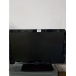 23 INCH BUSH TV AND REMOTE