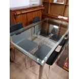 MODERN GLASS AND CHROME TABLE WITH 4 DINING CHAIRS