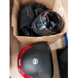 A BOX CONTAINING MOTORBIKE PROTECTIVE EQUIPMENT AND TOP BOX