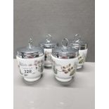 A SET OF 4 ROYAL WORCESTER EGG CODDLERS