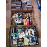 4 BOXES CONTAINING A SUBSTANTIAL AMOUNT OF CD SINGLES AND ALBUMS