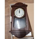 MODERN MAXIM CLOCK WITH A WOOD DESIGN