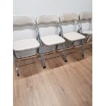 A SET OF 4 FOLDING CHAIRS