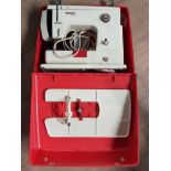 BERNINA SEWING MACHINE WITH ACCESSORIES AND CARRY CASE