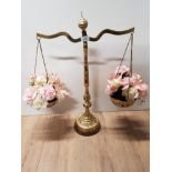 BRASS FLORAL PATTERNED APOTHECARY BALANCE SCALES CONTAINING ARTIFICIAL FLOWERS