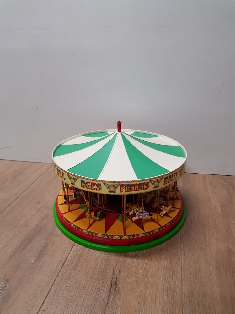 A BOXED DIE CAST ALL THE FUN FAIR CAROUSEL