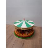 A BOXED DIE CAST ALL THE FUN FAIR CAROUSEL