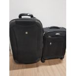 2 ASSORTED SIZED SUITCASES