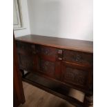 ORNATELY CARVED GOTHIC STYLE OAK SIDEBOARD WITH 3 DRAWERS ON 3 CUPBOARDS