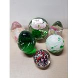 6 ASSORTED COLOURED GLASS PAPERWEIGHTS