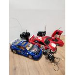 3 ASSORTED ELECTRONIC CARS WITH REMOTES