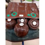 A SET OF 4 W A K LAWN GREEN BOWLS PLUS 2 OTHER BOWLS AND A CARRY BAG