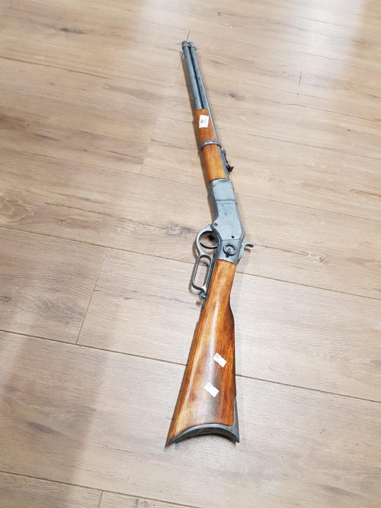 REPLICA OF A RIFLE.