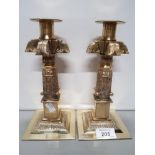 PAIR OF EASTERN STYLE BRASS ALTAR CANDLESTICKS