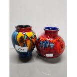 2 PIECES OF POOLE POTTERY INCLUDES GEMSTONE PATTERNED VASE AND VOLCANO PATTERNED BULBOUS VASE