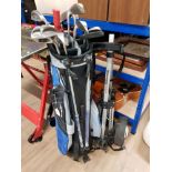 A GOLF BAG CONTAINING CLUBS AND A HOWSON PLUS LITE TROLLEY