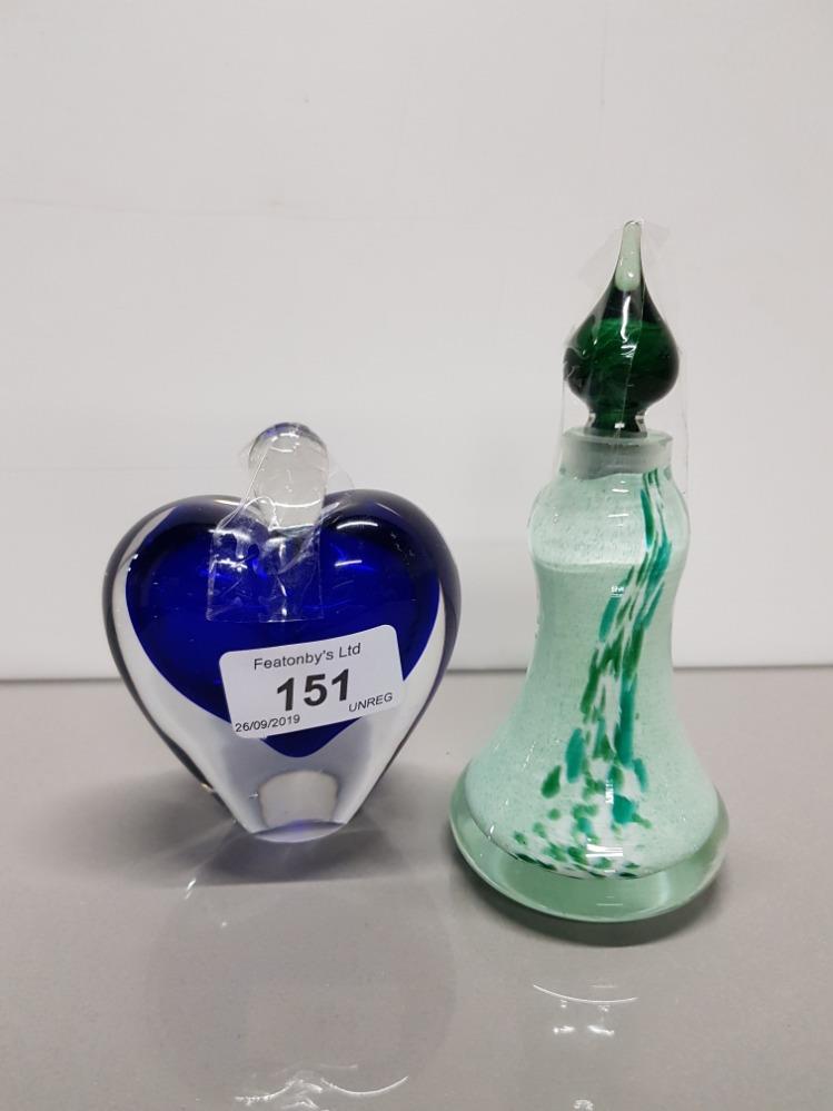 A GLASS HEART SHAPED PERFUME BOTTLE TOGETHER WITH ONE OTHER