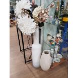 A LARGE GLASS VASE WITH ARTIFICIAL FLOWERS AND ONE OTHER