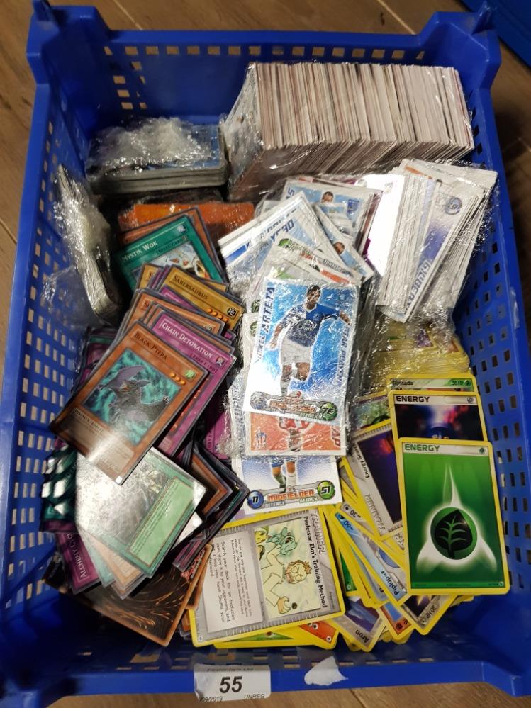 A BOX CONTAINING POKEMON YU GI UH AND MATCH ATTAX TRADING CARDS