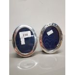 2 HALLMARKED SILVER FRAMED OVAL SHAPED PHOTO FRAMES