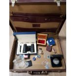 LEATHER CASE CONTAINING MISCELLANEOUS ITEMS INCLUDING BADGES AND CIGARETTE HOLDER ETC