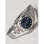 LADIES STAINLESS STEEL ROLEX WRISTWATCH WITH OYSTER BLUE DIAL DOME BEZEL 26MM OYSTER STRAP YEAR