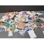 SUBSTANTIAL AMOUNT OF STAMPS FROM AROUND THE WORLD