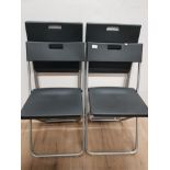 A SET OF 4 FOLDING PLASTIC METAL FRAMED CHAIRS