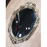 OVAL SHAPED MIRROR WITH PAINTED SILVER FRAME