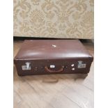 A VINTAGE GLOBE TROTTER SUITCASE