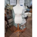 SHOP MANNEQUIN ON A WOODEN PEDESTAL BASE