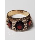 9CT GOLD GARNET AND CZ RING SIZE K GROSS WEIGHT 4G