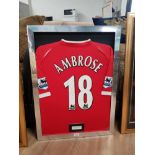 FRAMED AND MOUNTED DARREN AMBROSE SIGNED FOOTBALL SHIRT CHARLTON ATHLETIC 2006 TO 2007